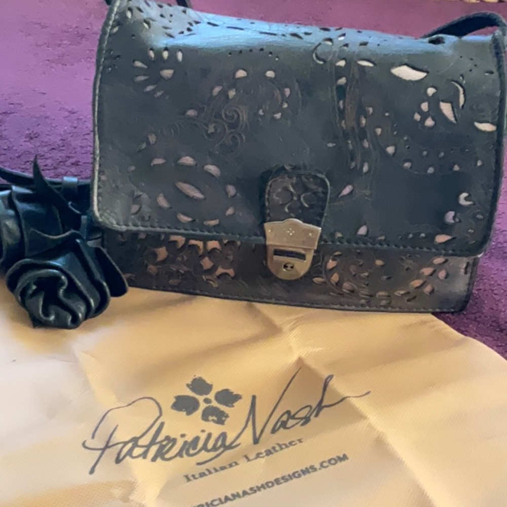 PATRICIA NASH vintage small black leather tooled design messenger bag.